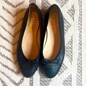Chanel black leather flats